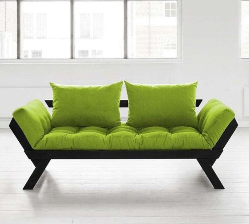 Garden daybed sofa with lime cushions on a black frame