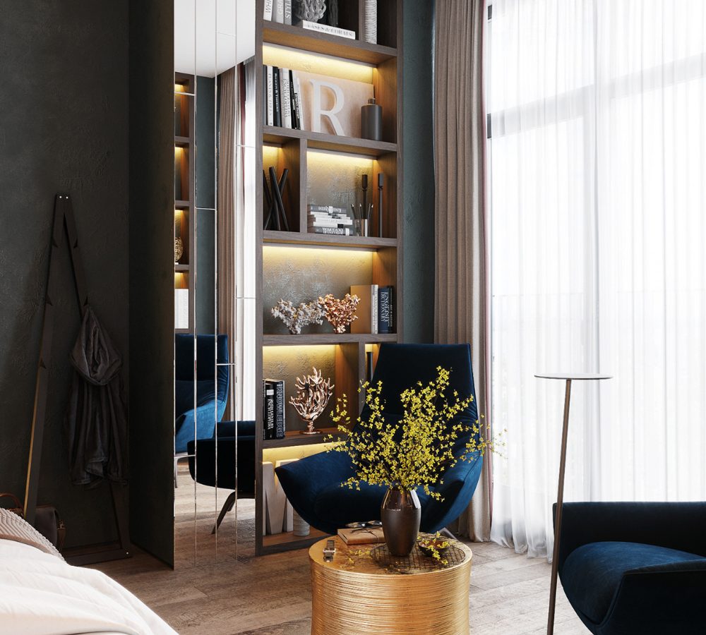 Libreria illuminata e poltrona in una suite