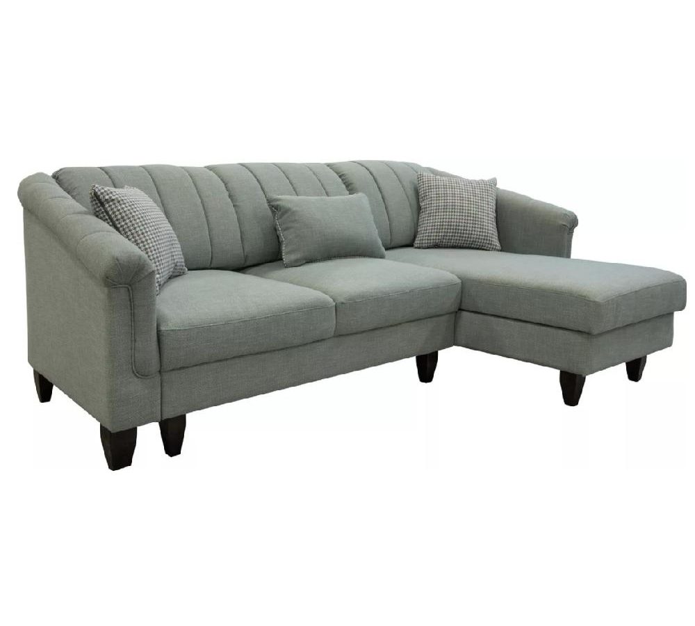 Divano angolare grigio-verde su gambe scure