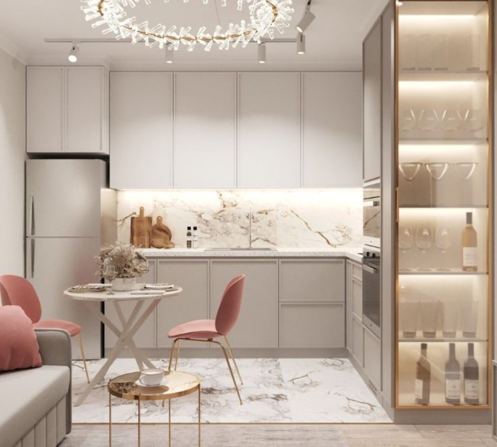 Light kitchen with a display cabinet and pink chairs