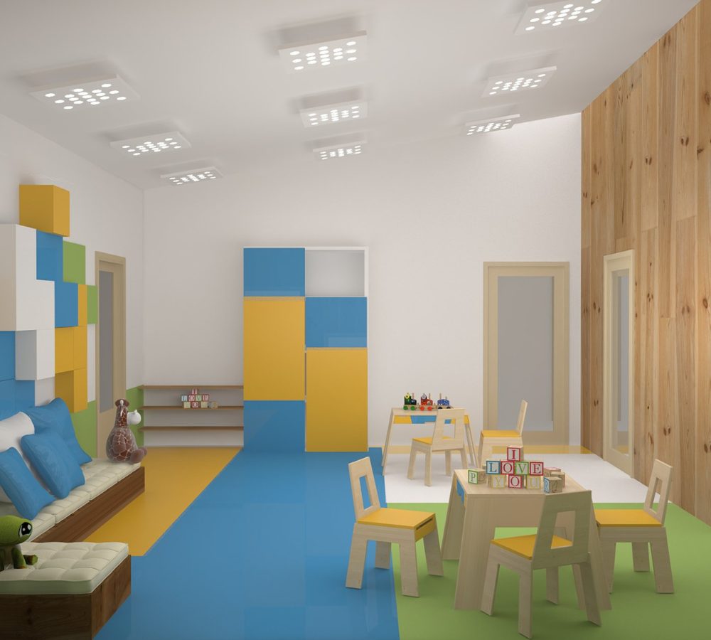 Kindergartenraum mit Spinden und Tischen