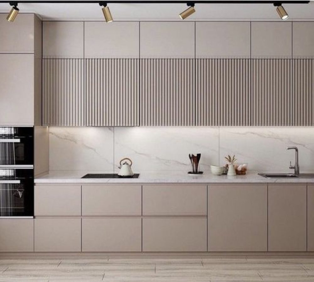 Beige kitchen with fluted wall cabinets