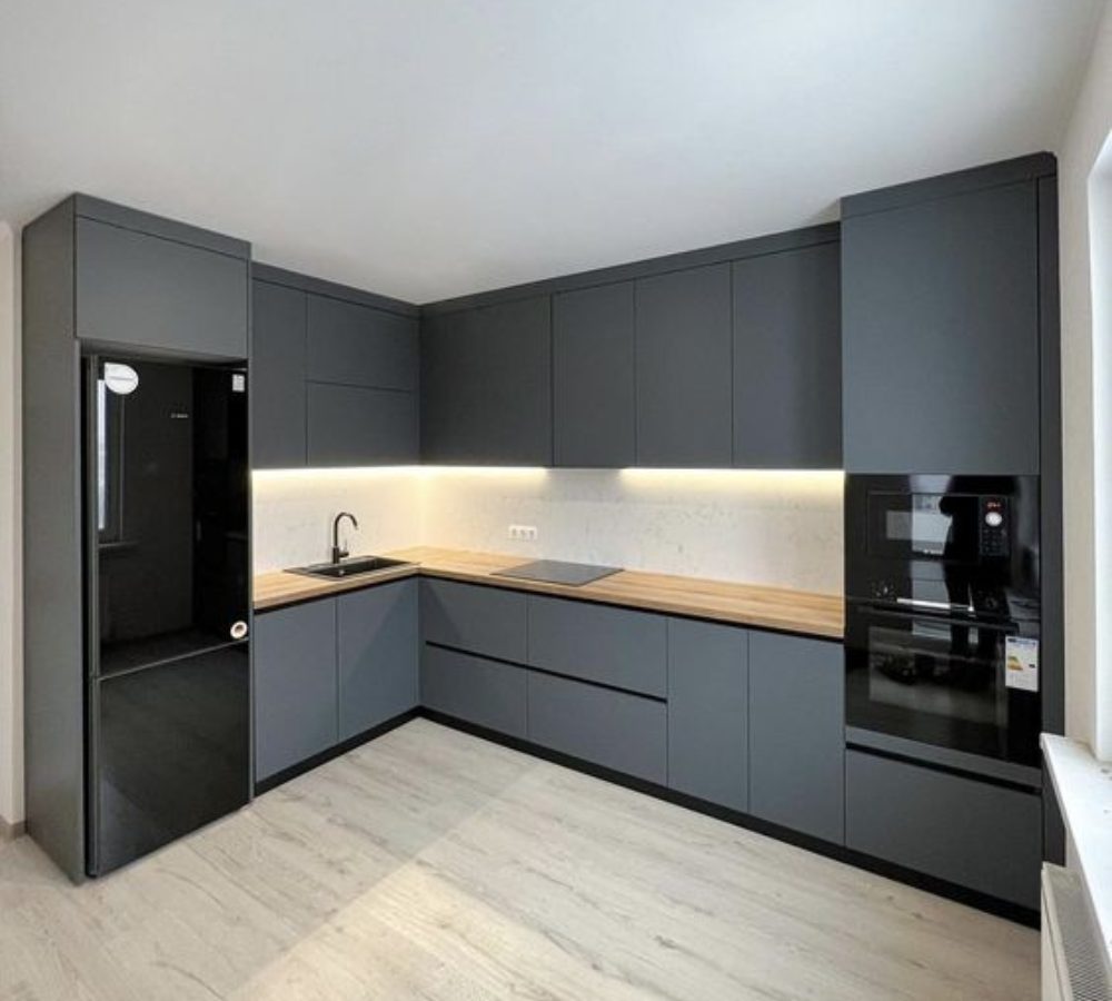 Graphite corner kitchen with a wooden worktop