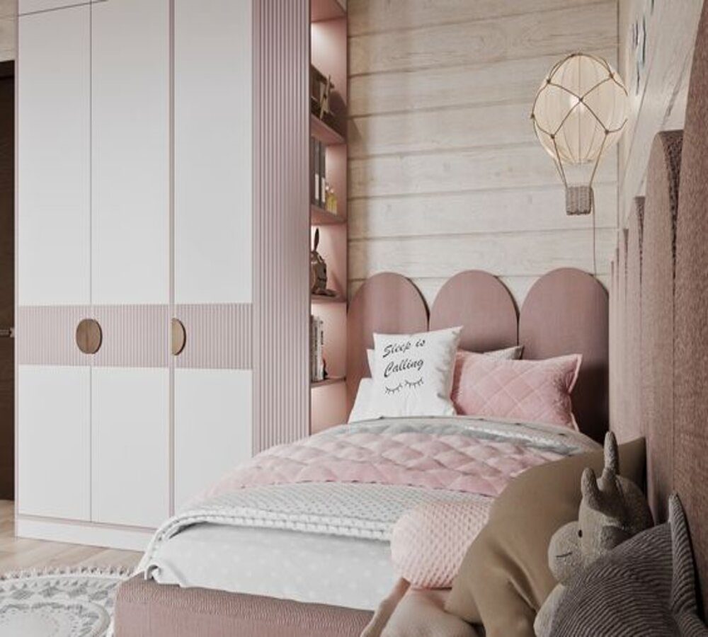 Kinderbett mit weichem Wolken-Kopfteil und Schrank