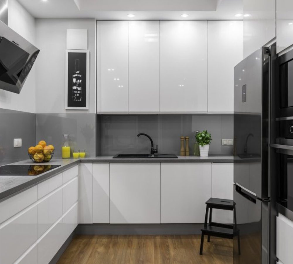 White corner kitchen with gloss fronts