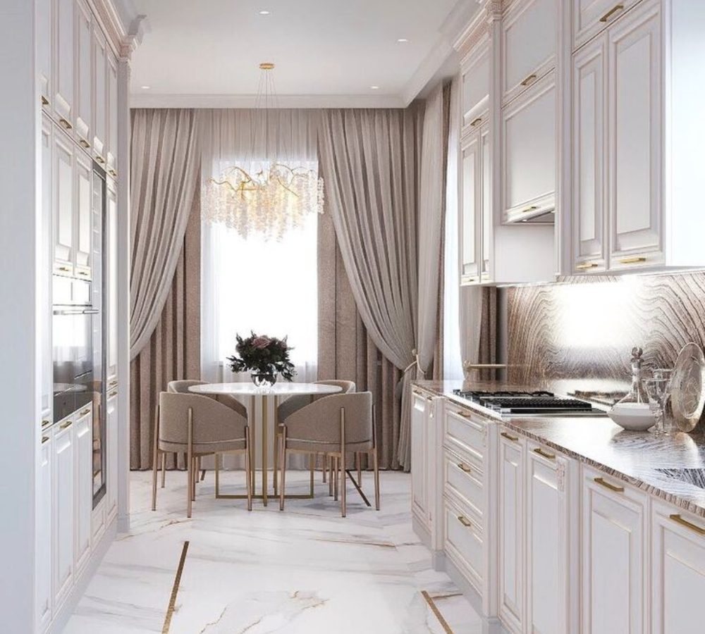 White kitchen with a dining area by the window